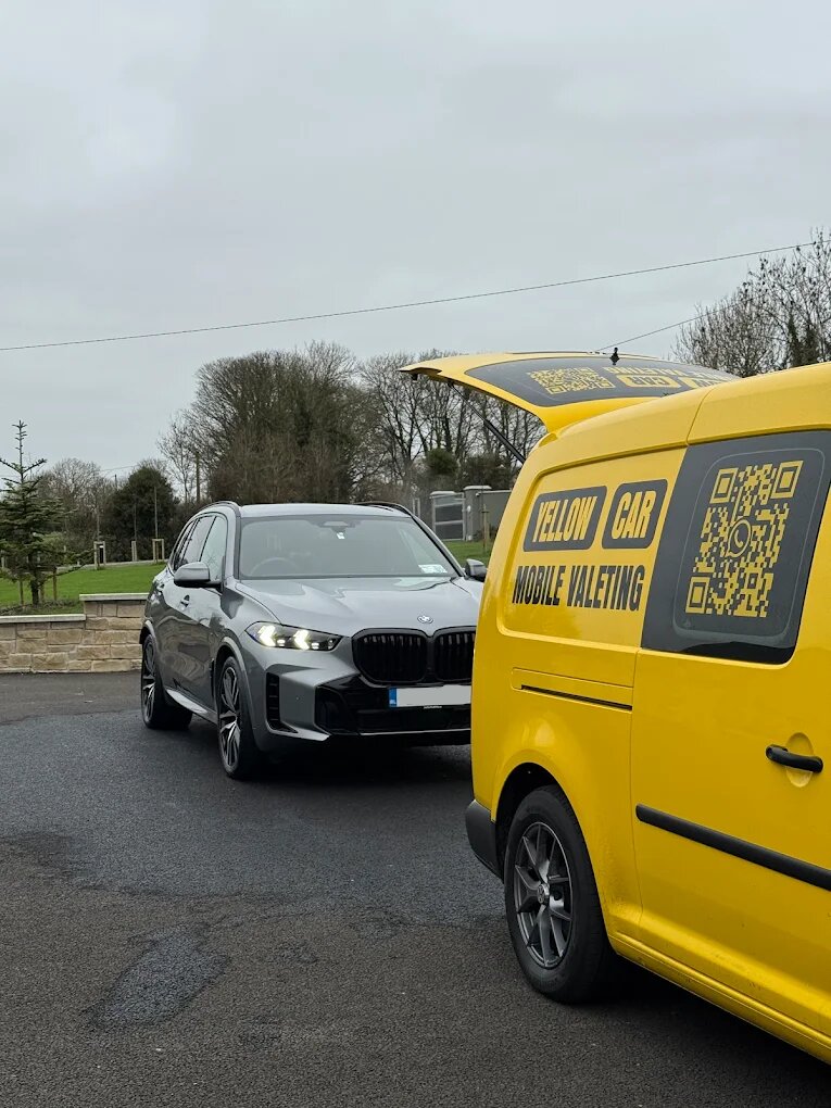 BMW X5 with YellowCar van